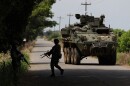 Soldiers patrol a road in Jamundi, Colombia, Wednesday, May 20, 2026, an area that has endured frequent attacks by a dissident branch of the former Revolutionary Armed Forces of Colombia, or FARC, guerrilla group.