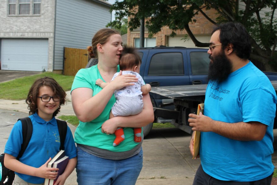 The Cantu family unload from the car after a commute from IDEA Judson on May 13, 2019. Lucas Cantu, 9, brought two Harry Potter books to school that day to read between standardized tests.