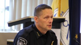 Anchorage Police Chief Sean Case speaks to Assembly members on July 19, 2024. (Wesley Early/Alaska Public Media)