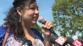 Erika Fierro speaks to media after returning from her immigration check-in. She was concerned Thursday's check-in would end in her immediate deportation.