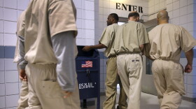 Inmates walk through Enfield's Cybulski Rehabilitation Center in 2016.