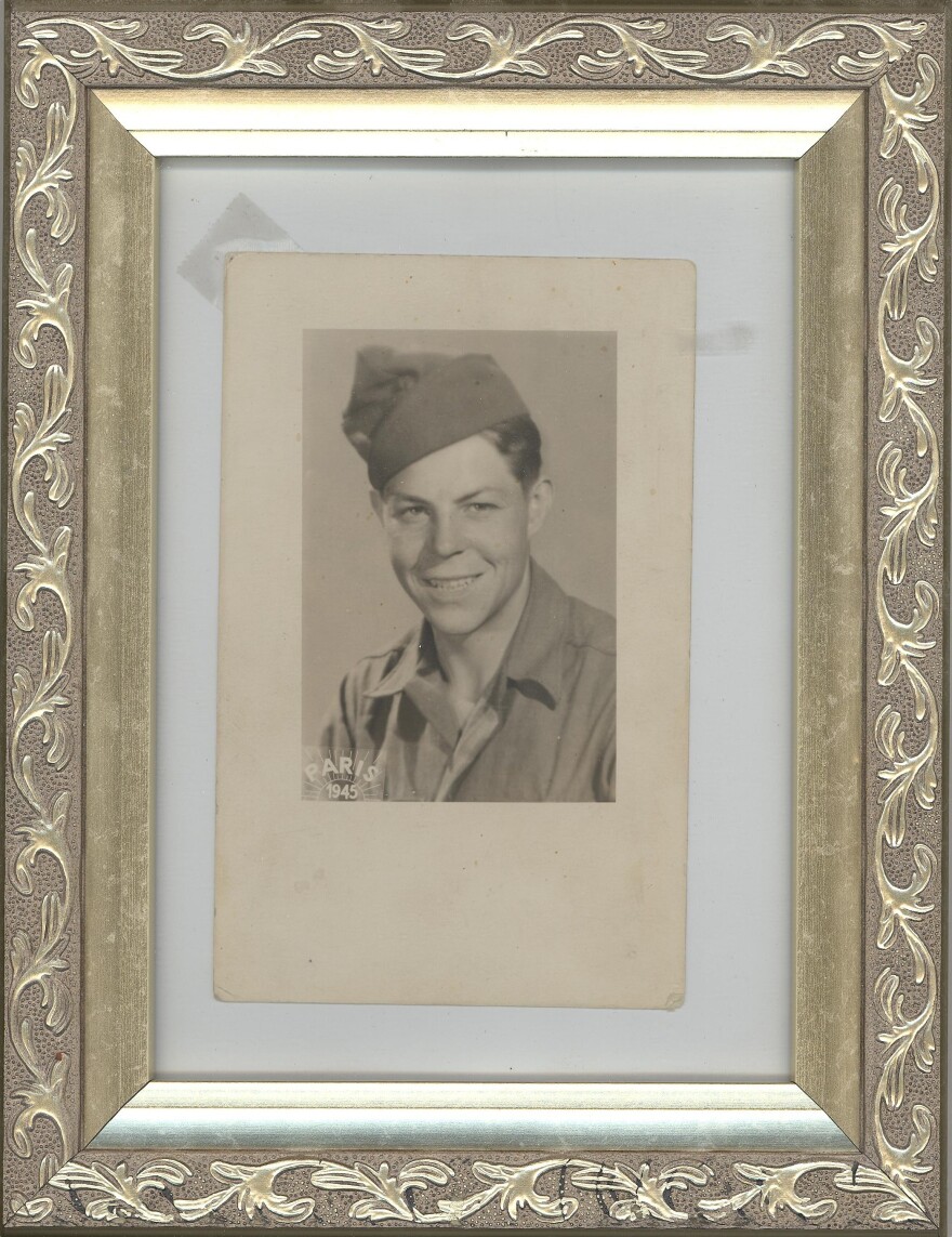 Gold framed picture of Joe Lolley in uniform