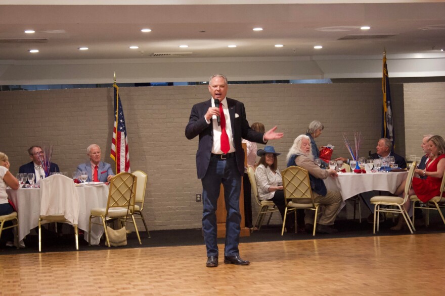 Republican Bert Mizusawa speaking at a campaign event.