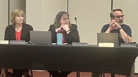 Washington Finance Director Joanie Baxter (left), Paulette Hurd and Police Chief Jeff Stevens watch a presentation Monday at a City Council meeting. Baxter is retiring soon after more than 30 years in her position and is being replaced by Hurd, who was hired earlier this month.