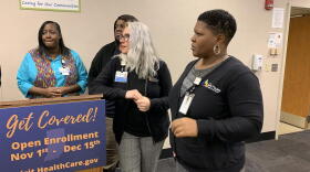 Employees from the Jane Pauley Community Health Center at an open enrollment visit. (Jill Sheridan/IPB News)