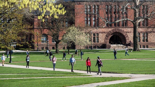 Students walk on the Oval on Ohio State's campus. 