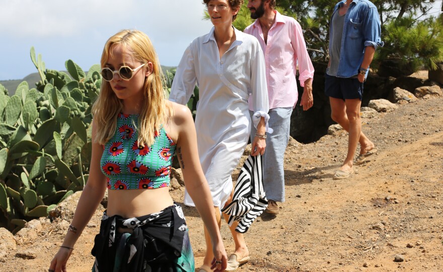 Penelope (Dakota Johnson), Marianne (Swinton), Harry (Fiennes) and Paul (Matthias Schoenaerts) are an unlikely foursome on the Mediterranean island of Pantelleria.