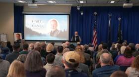 David Wartinbee speaks at a memorial for Gary Turner at Kenai Peninsula College in Soldotna, Alaska, on May 31, 2026.
