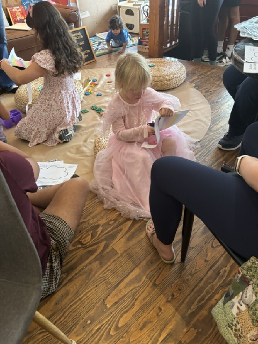 Children participate in activities at the Morning Book Club and Poetic Republic Coffee where the Imagination Library of San Antonio enrolled children in their book giveaway program.