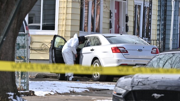A crime scene investigator is seen outside an apartment house on New Alexander Street, Wilkes-Barre, on Tuesday afternoon, Feb. 24, 2026.