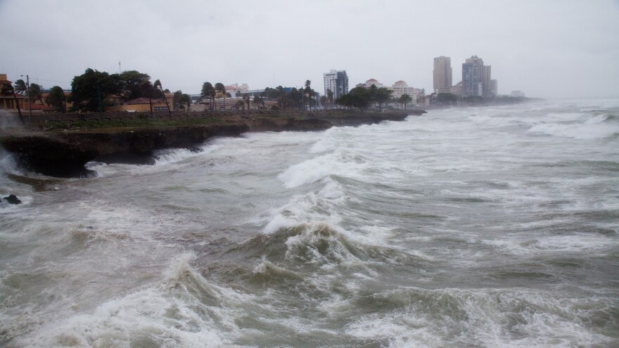 Tropical Storm Erika roils the surf off the Dominican Republic late Friday morning.