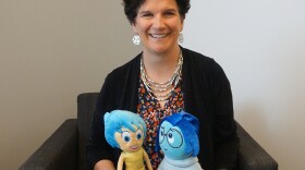 Jill Stratton of Washington University researches the psychology of young adulthood, and part of her mission is to help students be happy and successful. Here, she poses with Joy and Sadness from the 2015 movie "Inside Out."