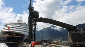 The Disney Wonder cruise ship docks near the ship loader at Skagway’s ore terminal. (Photo by Henry Leasia, KHNS - Haines)