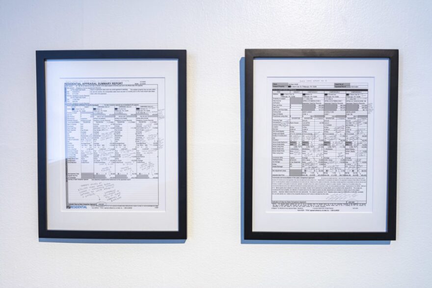 The two appraisals for Shirley Salmon-Davis's house as seen in "Sed Valorem" at the Mattress Factory.