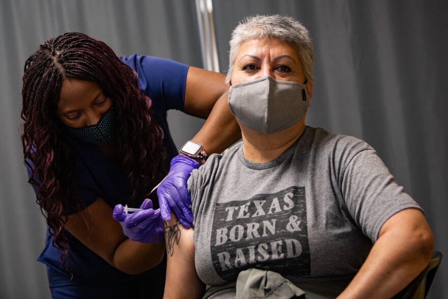 Sofia Peña receives a coronavirus vaccine at a clinic hosted by the Central Texas Allied Health Institute on March 27.