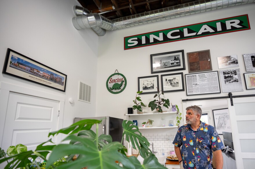 Tony Johnson, who has restored several historic buildings throughout Cache Valley, stands in his office, a renovated Sinclair gas station in River Heights, on May 5.