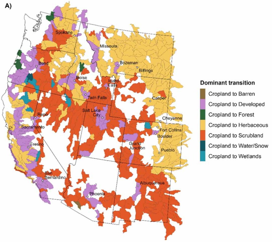 Color-coded map of the Western U.S. showing the dominant land cover replacing cropland in watersheds affected by wildfires. Orange indicates shrubland, yellow indicates grasses and other herbaceous vegetation, and purple indicates developed land.