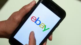 An eBay app logo is shown on a mobile phone, July 11, 2019, in Miami. (Wilfredo Lee/AP)