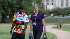 Sean Jones and his batterer intervention facilitator, Sherri Jolly, attended a Domestic Violence Awareness Month event on Oct. 9. The yearlong program is part of a plea deal Jones received in lieu of prison time for a domestic abuse charge.