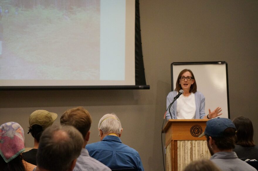 U.S. Rep. Andrea Salinas, a Democrat representing Oregon’s 6th Congressional District and ranking member of the forestry subcommittee of the House Committee on Agriculture, speaks to a crowd at the Ecotrust building in Portland on April 8, 2026. Salinas said she would fight against Trump administration efforts to terminate the 25-year-old Roadless Rule that prohibits road construction, logging and mining on about 30% of Forest Service managed lands.