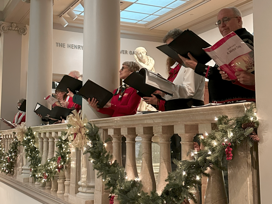 Members of the Manchester Choral Society sing in the Currier's galleries.