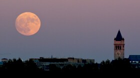 A supermoon rises over Washington, D.C., in November 2016. After this week's Strawberry Supermoon, there will be two more in July and August.