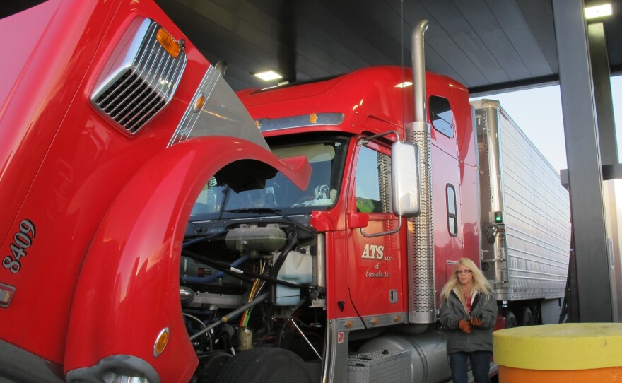 Drivers fill up at the Petro truck stop in Oak Grove, Mo. Because most drivers are paid by the mile, delays at stops eat directly into their earnings.