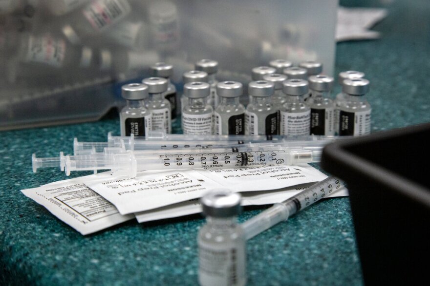 Doses of the Pfizer coronavirus vaccine are seen being prepared on Wednesday, May 12, 2021, in Decatur, Ga. Hundreds of children, ages 12 to 15, received the Pfizer vaccine at the DeKalb Pediatric Center, just days after it was approved for use within their age group. (AP Photo/Ron Harris)