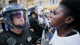 "I won't let you won't kill me or my child," a protester yells at a Collier County Sheriff's Deputy on Monday in downtown Naples. More than 200 people protested in response to the recent death of George Floyd in Minneapolis. Derek Chauvin, a former Minneapolis police officer, has been charged in Floyd's killing. There were several tense encounters between protesters and Collier County Sheriff's deputies in combat gear, but no violence broke out. Several arrests were made. Protesters began at the Collier County Courthouse, marched to Fifth Avenue South, closing US 41 in the process.