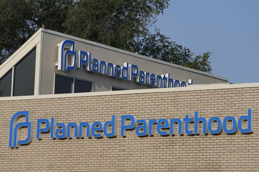 A Planned Parenthood sign is displayed on the outside of the clinic, Aug. 1, 2023, in Indianapolis.