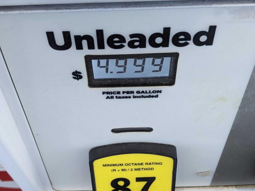 Unleaded gas price read-out of $4.99
