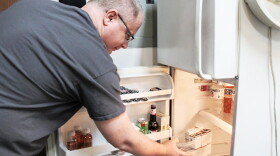 Craig Miller, who has Type 1 diabetes, stores insulin in a refrigerator in his garage.