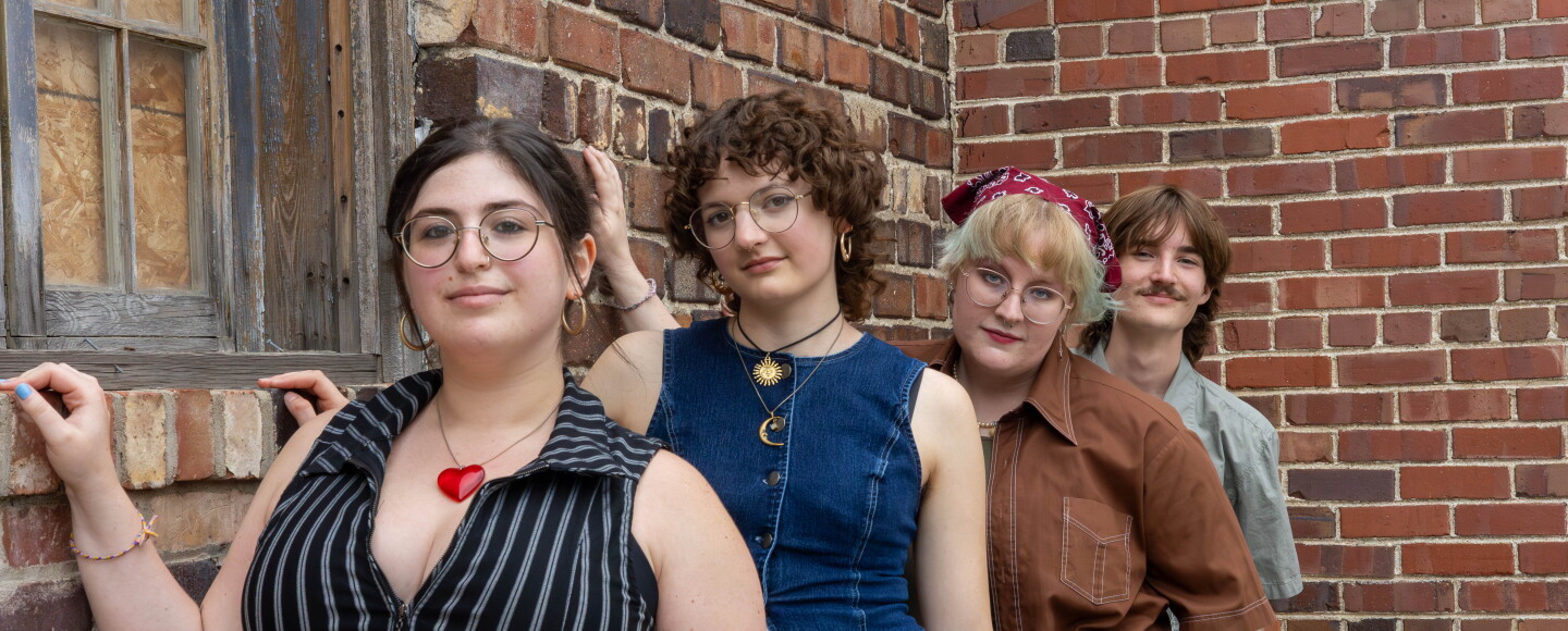 a group of people posing for a photo