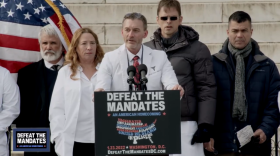 Dr. Ryan Cole speaks at a “Defeat the Mandates” rally in Washington, D.C., on Jan. 23, 2022. “Let doctors be doctors, and let us treat patients and save their lives. Don’t shackle our hands. We will not comply with your silliness,” he said. (Screenshot from livestream video)