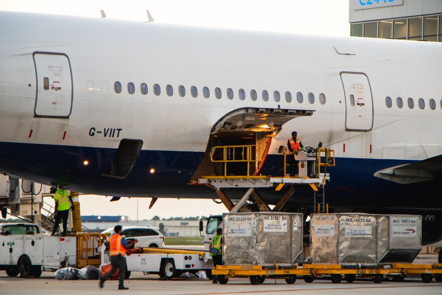 Cargo being loaded onto a plane at MCO.