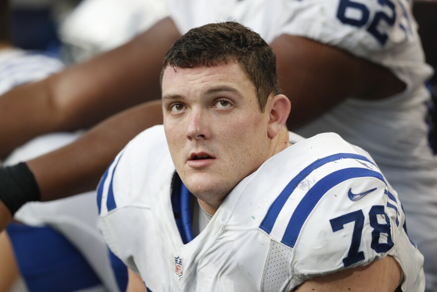 Indianapolis Colts center Ryan Kelly watches from the sidelines during the second half of an NFL football game against the Minnesota Vikings Sunday, Dec. 18, 2016, in Minneapolis. (AP Photo/Charlie Neibergall)
