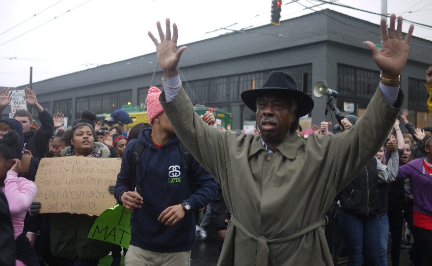 Marchers demonstrate on Tuesday, Nov. 25,  in response to the lack of indictment of Darren Wilson, a St. Louis police officer who shot Michael Brown in August.