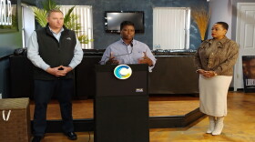 Council members Tamaya Dennard (center) and  Chris Seelbach (left) spoke with Brittani Gray (right) at a press conference Thursday morning.