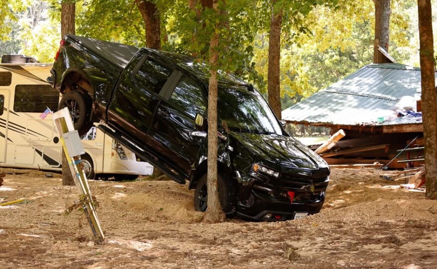 A truck that has been displaced and damaged after the July 10 flash flood at Riversedge Campground.