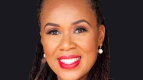 Monique Worrell smiling into the camera