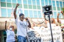 Gordon Plaza resident Jessie Perkins rallies with other residents and supporters in front of City Hall on Thursday, June 23, 2022.