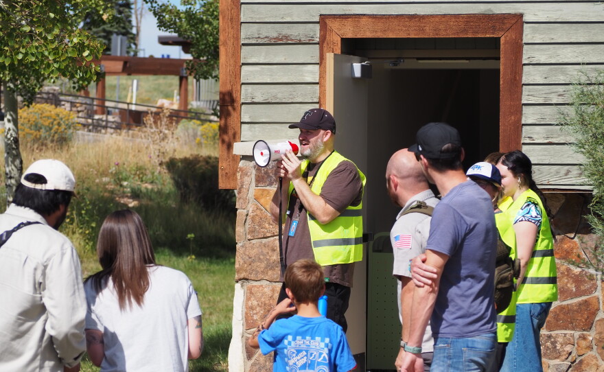 Summit County Library Director Dan Compton kicks off the Oct. 3, 2026, book brigade behind the Sheldon Richins Building in Kimball Junction.