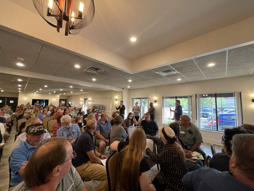 Concerned Rockton residents meet at the Mary's Market Banquet hall to discuss their options.