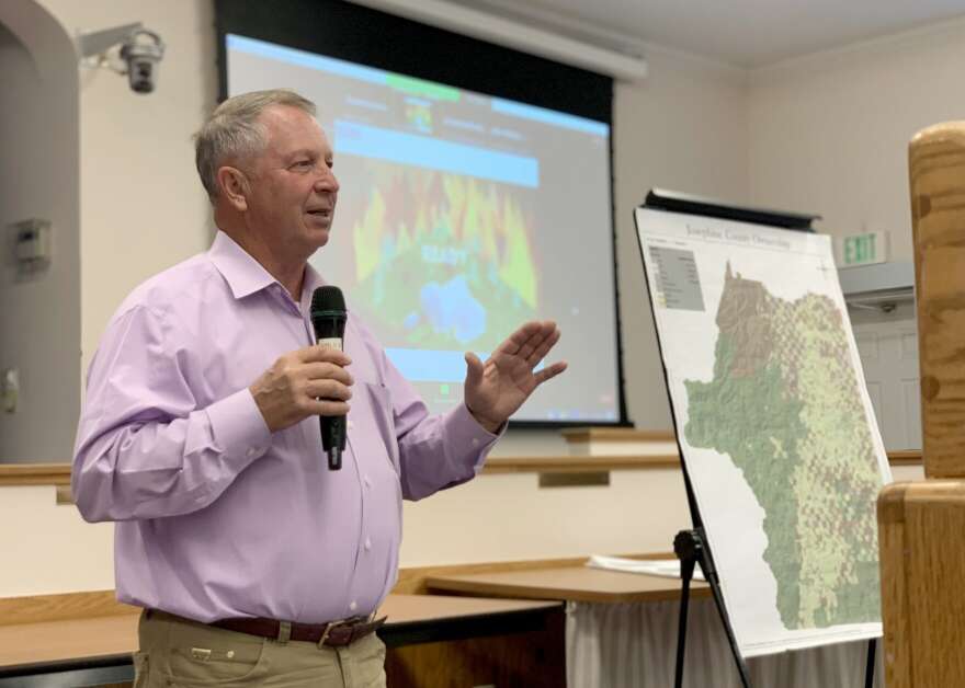 Josephine County Board of Commissioners Chairman Herman Baertschiger speaking at a wildfire town hall in Grants Pass in 2022.