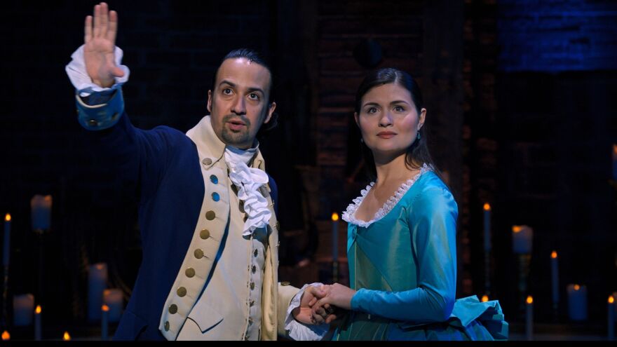 Lin-Manuel Miranda and Phillipa Soo return as Alexander and Eliza Hamilton, the roles they played in the original Broadway production of <em>Hamilton</em>. A film production of the show, taped in 2016, debuts on Disney+ on Friday.