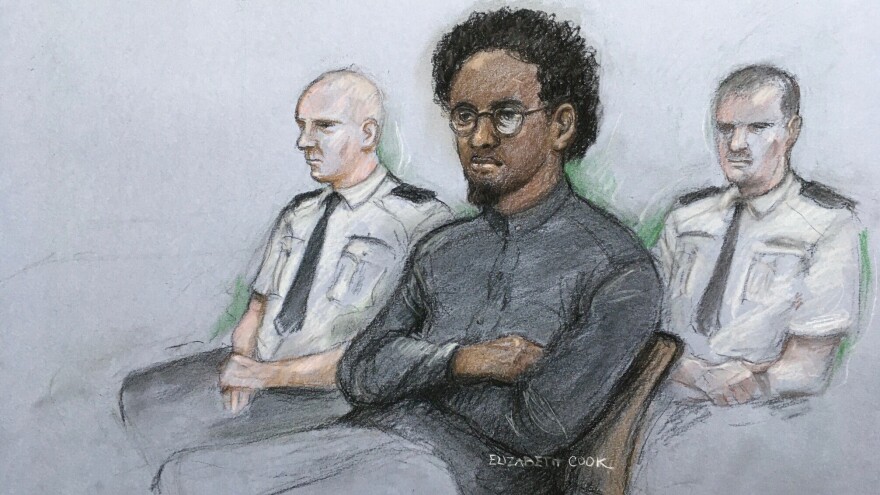 This court artist sketch by Elizabeth Cook shows Ali Harbi Ali in the dock at the Old Bailey accused of stabbing to death David Amess, a Conservative member of Parliament, in London on March 21.