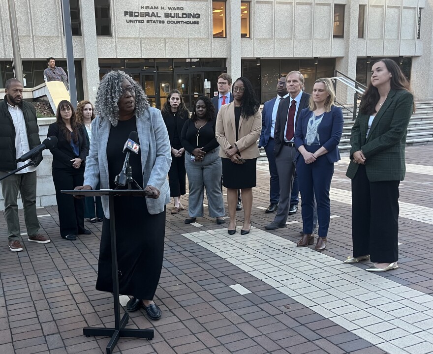 North Carolina NAACP President Deborah Dicks Maxwell speaks in front of the Hiram Ward Federal Building in Winston-Salem