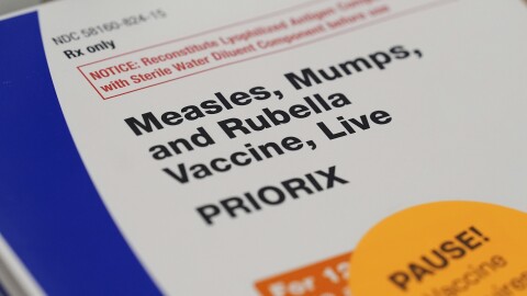 A box containing doses of the measles, mumps, and rubella vaccine (MMR) are displayed at a CVS Pharmacy, Tuesday, Sept. 9, 2025, in Miami. (AP Photo/Rebecca Blackwell)