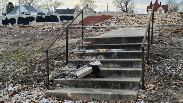 Parts of the property are contaminated with lead, and the concrete foundation and parking lot remain along with the rubble of the building.