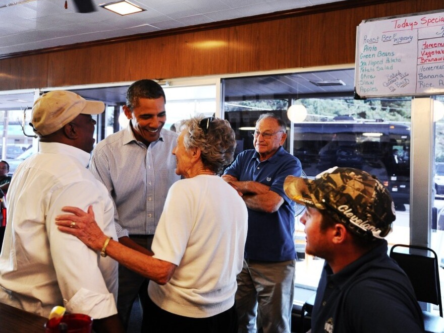 <p>The president greets diners at the Reid's House Restaurant in Reidsville, N.C., on Tuesday. </p>